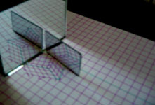 Fotografia de dos espejos perpendiculares, mostrando una nueva combinación del cubo.